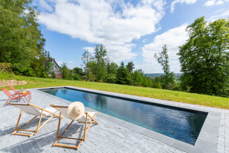 Construction-piscine-béton-couloir-nage-sur-mesure-ambiance-Hydramat-Rostronen-Saint-Brieuc-Vannes-Languidic